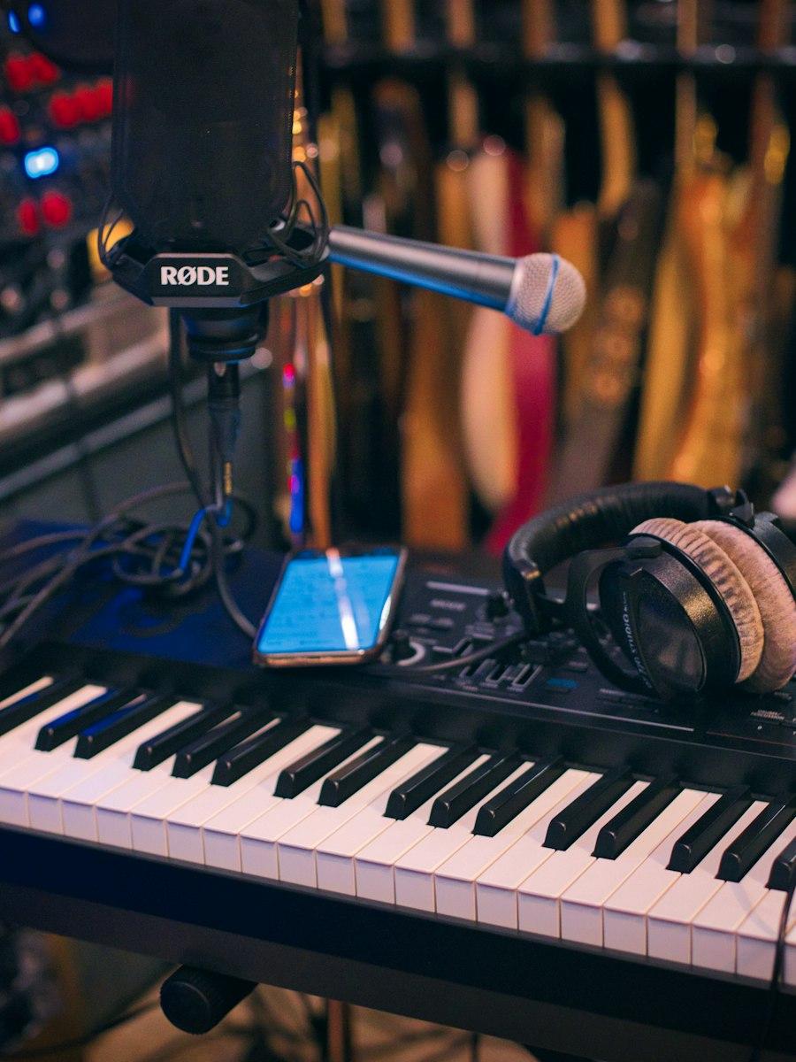 A microphone and keyboard in a studio