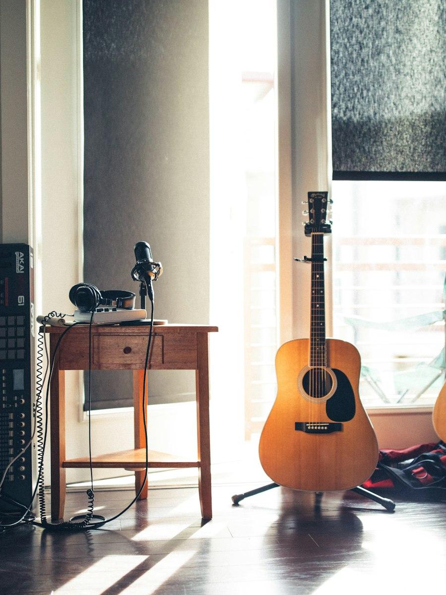 A guitar and microphone set up to record